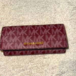 Michael Kors Plum folded wallet